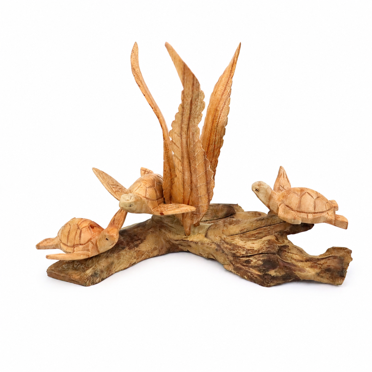 Handcrafted wooden sea turtle sculpture on a natural wood base