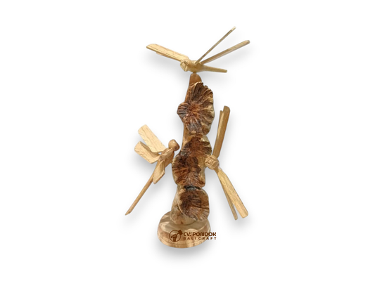 Three hand-carved wooden dragonflies surrounding bracket mushrooms on a freestanding wooden sculpture
