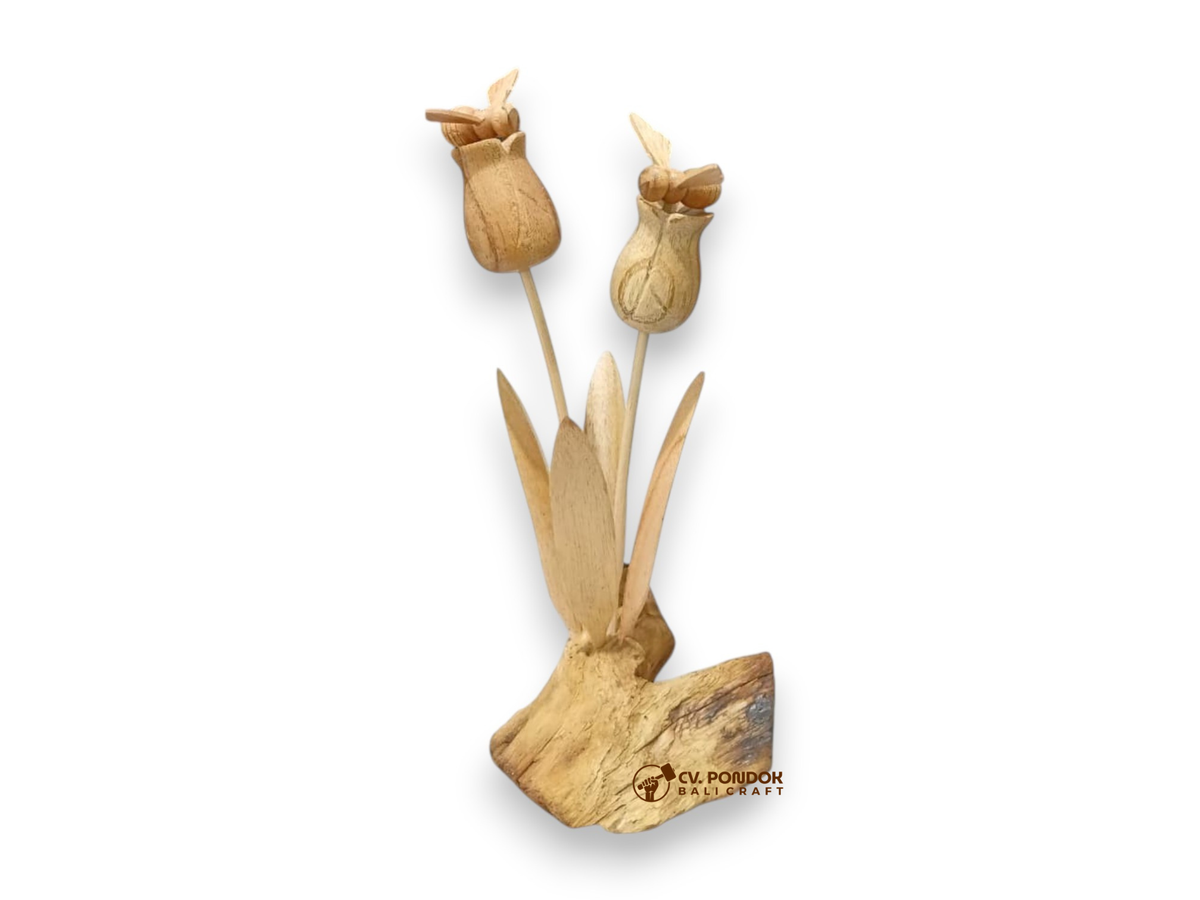 Two hand-carved wooden bees resting on tall wildflowers with leaves and a natural rootwood base