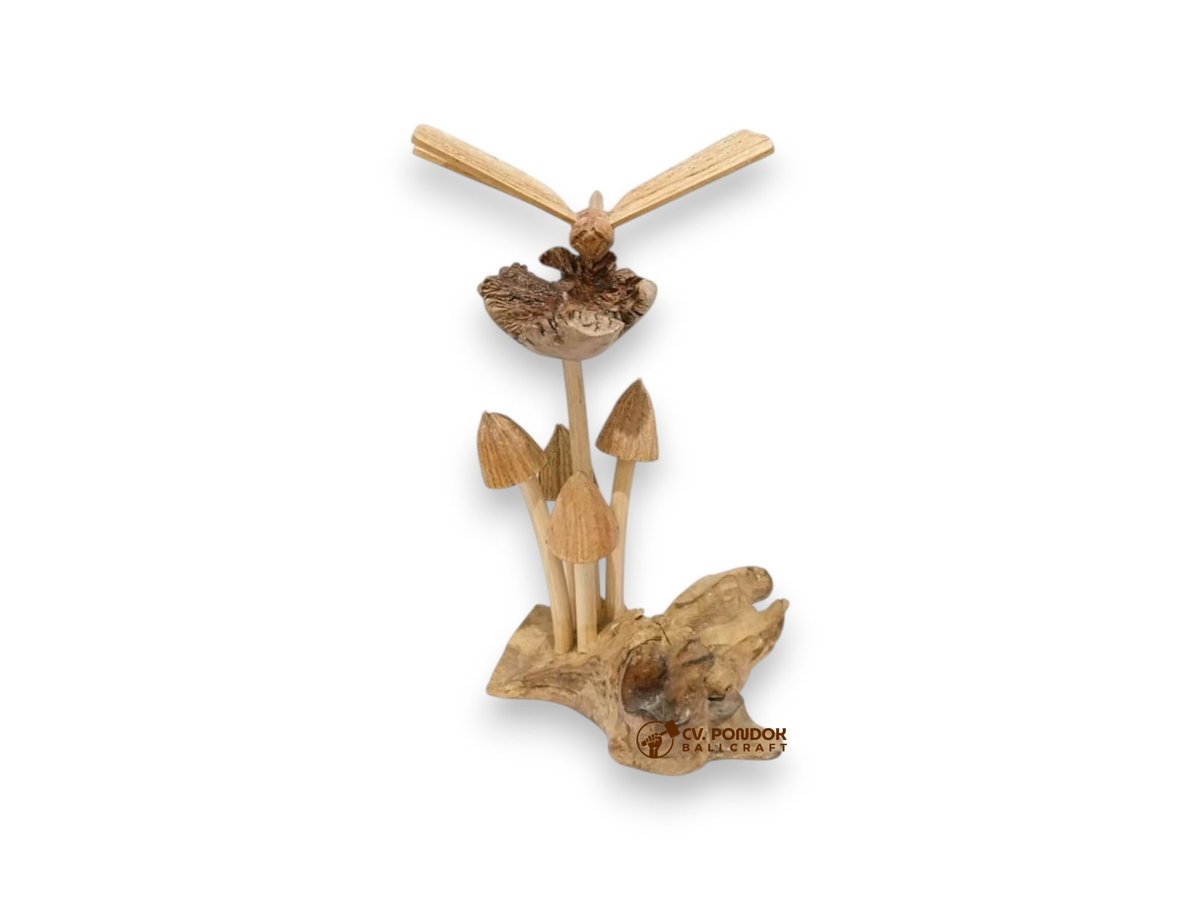 Hand-carved wooden dragonfly hovering above four mushrooms on a naturally shaped wood base
