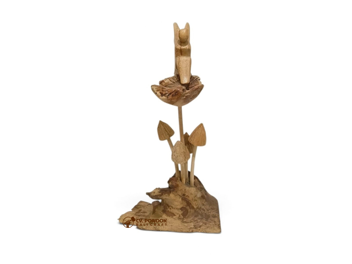 Hand-carved wooden winged fairy sitting on a tall flower above four mushrooms on a natural wood base