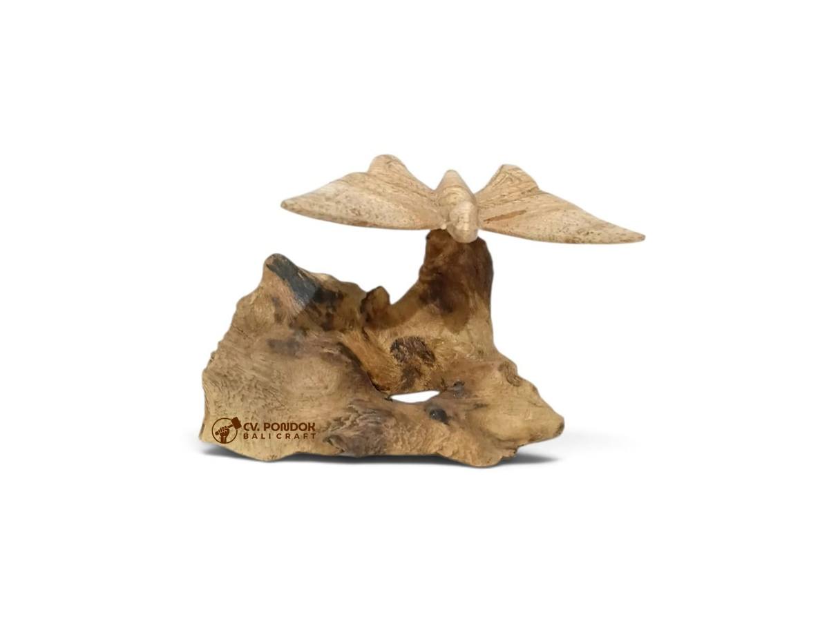 Hand-carved wooden butterfly with fully extended wings on a natural wood base, minimum size 7 by 5 cm