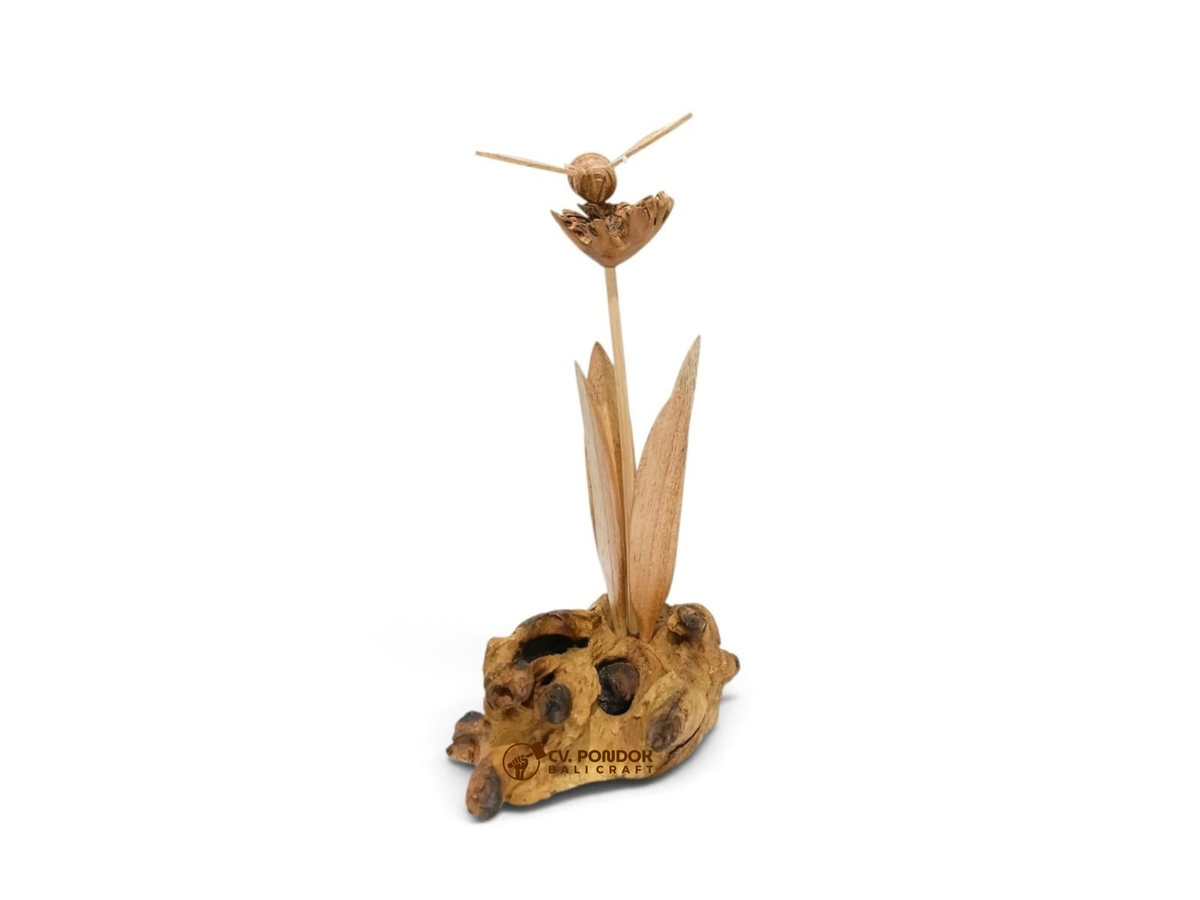 Hand-carved wooden bee resting on a flower with leaves and natural wood base, minimum 21 cm high and 6 cm wide