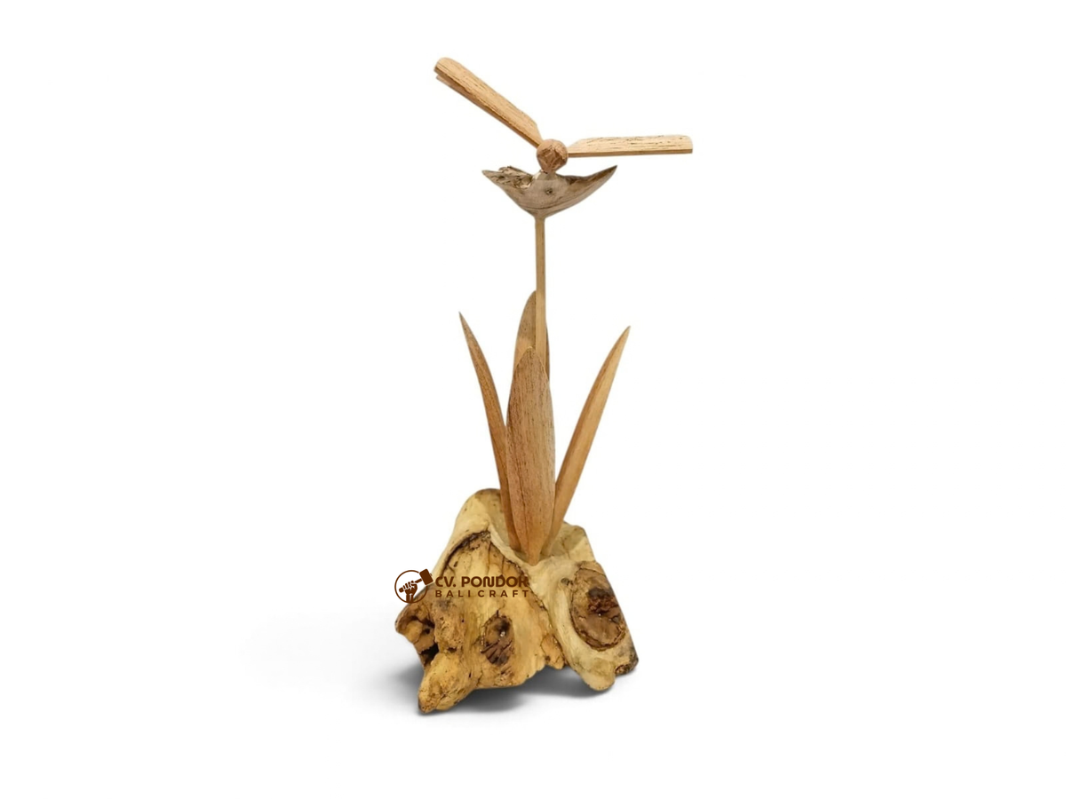 Hand-carved wooden dragonfly resting above a flower with leaves and natural wood base, minimum 21 cm high and 6 cm wide