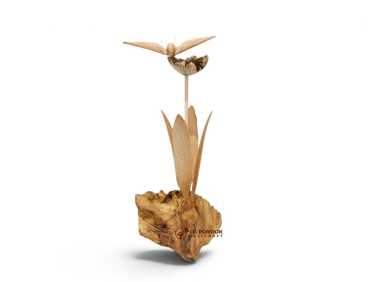 Hand-carved wooden butterfly resting above a flower with leaves and natural wood base, minimum 21 cm high and 6 cm wide
