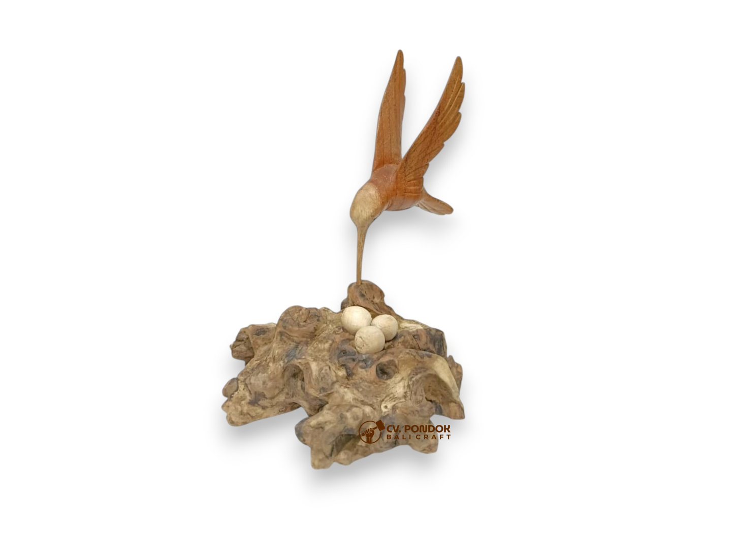Hand-carved wooden hummingbird hovering over a nest with three eggs on a natural rootwood base