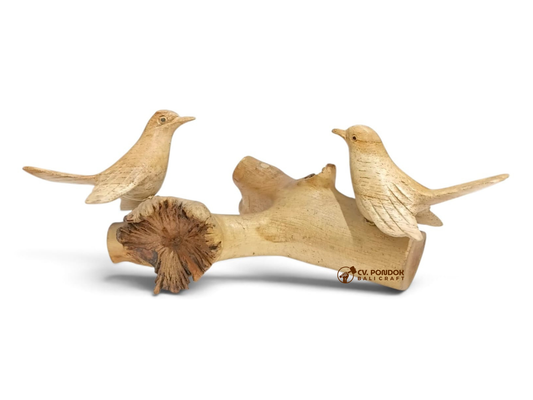 Hand-carved wooden bird couple facing each other on a natural rootwood base with a carved wooden flower
