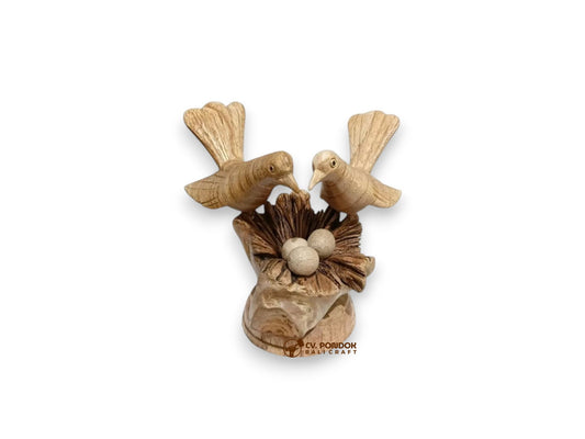 Hand-carved wooden bird couple with nest and three eggs, minimum 13 cm wide