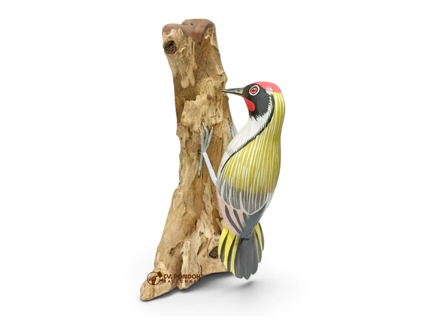 Hand-painted wooden woodpecker with a red crown and yellow-green wings clinging to a natural rootwood trunk
